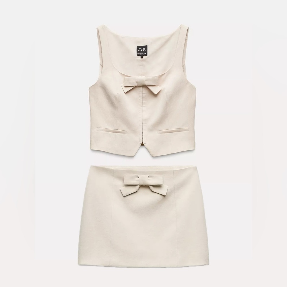 SET OF BOW MINI SKIRT AND VEST TOP